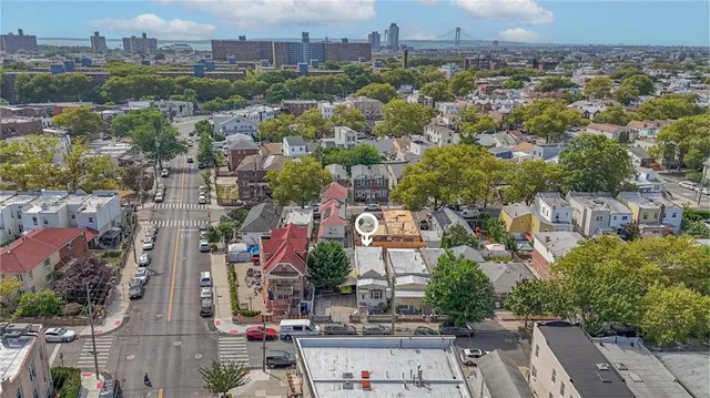 an aerial view of a city with lots of residential buildings
