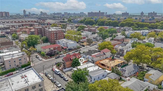 an aerial view of a city with lots of residential buildings