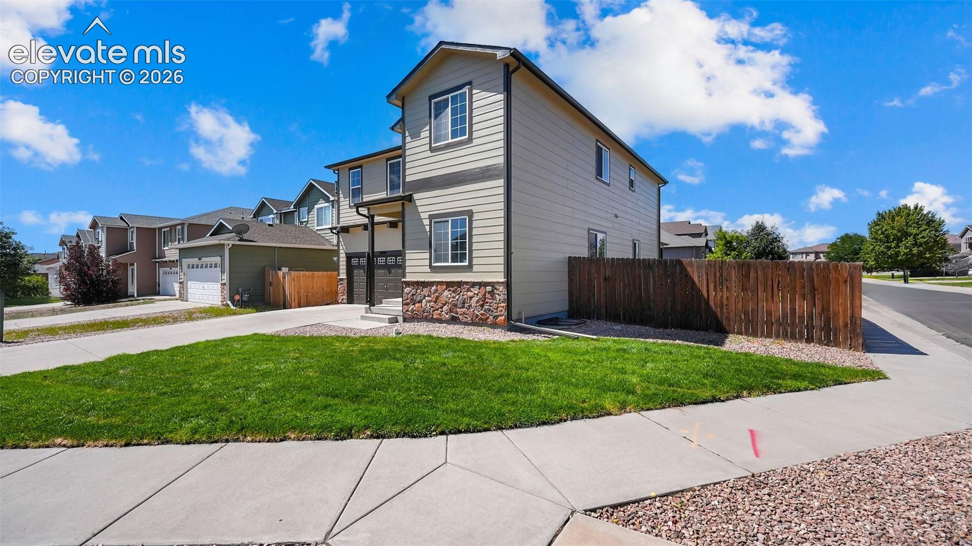 2044 Reed Grass Way Colorado Springs, CO 80915 - Photo 3 of 47 Brand new exterior paint