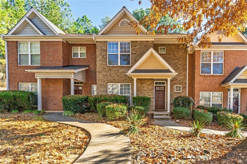 2020 Austin Park Circle Decatur, GA 30032 - Photo 1 of 1 a front view of a house with garden