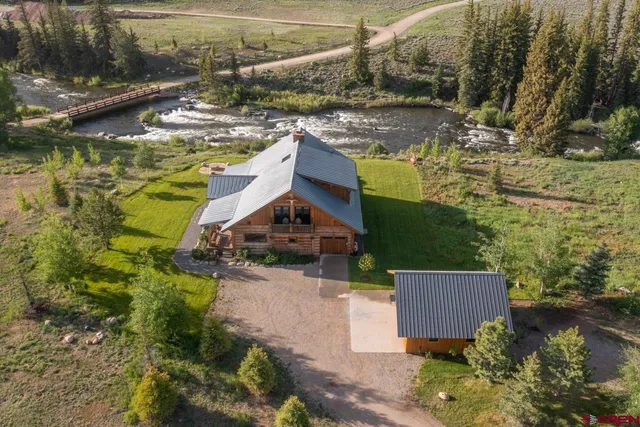 a view of a house with a lake view