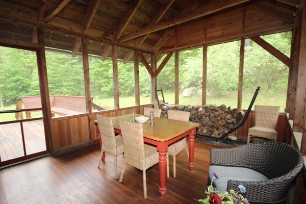 91 Long Hill Road Leverett, MA 01054 - Photo 16 of 29 a view of a living room with furniture and wooden floor