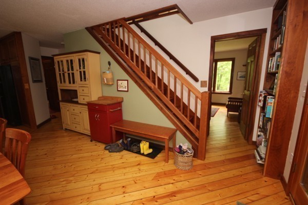 91 Long Hill Road Leverett, MA 01054 - Photo 17 of 29 a view of entryway and hall with wooden floor