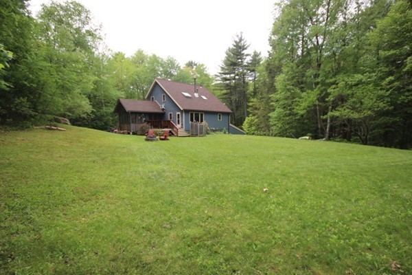 91 Long Hill Road Leverett, MA 01054 - Photo 2 of 29 a view of a house with a yard