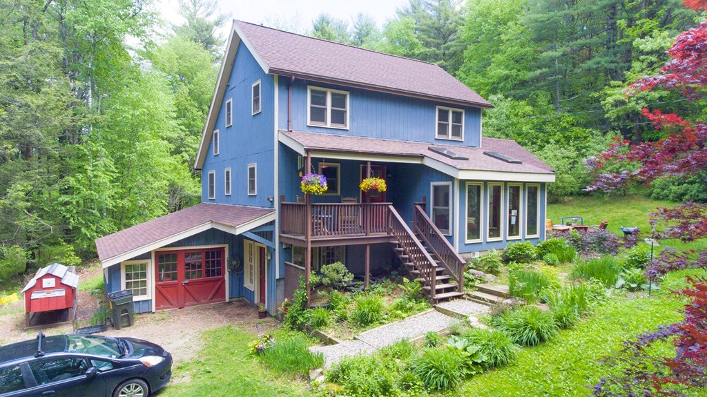 91 Long Hill Road Leverett, MA 01054 - Photo 29 of 29 a front view of a house with a garden
