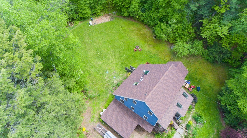 91 Long Hill Road Leverett, MA 01054 - Photo 3 of 29 an aerial view of a house with a yard and lake view