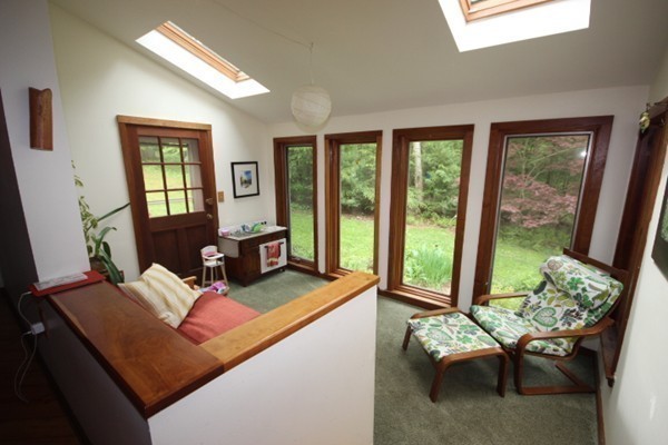 91 Long Hill Road Leverett, MA 01054 - Photo 9 of 29 a living room with furniture and a large window