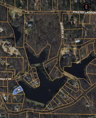 a view of a swimming pool with outdoor seating