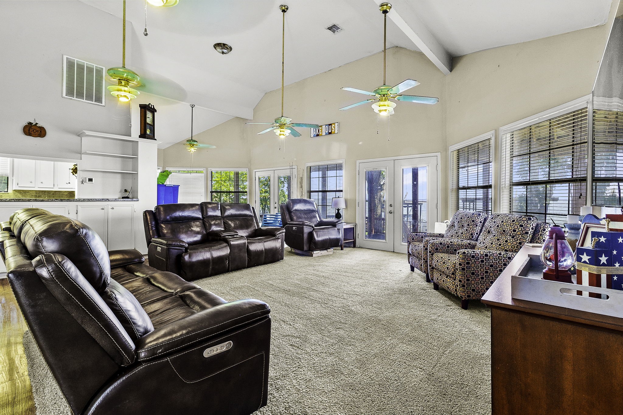 536 Weavers Cove Road Livingston, TX 77351 - Photo 16 of 44 a living room with furniture a chandelier and a window