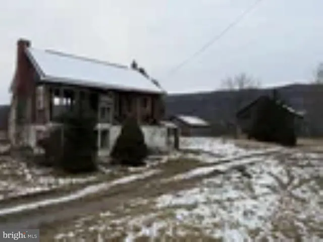 a view of a street with some trees