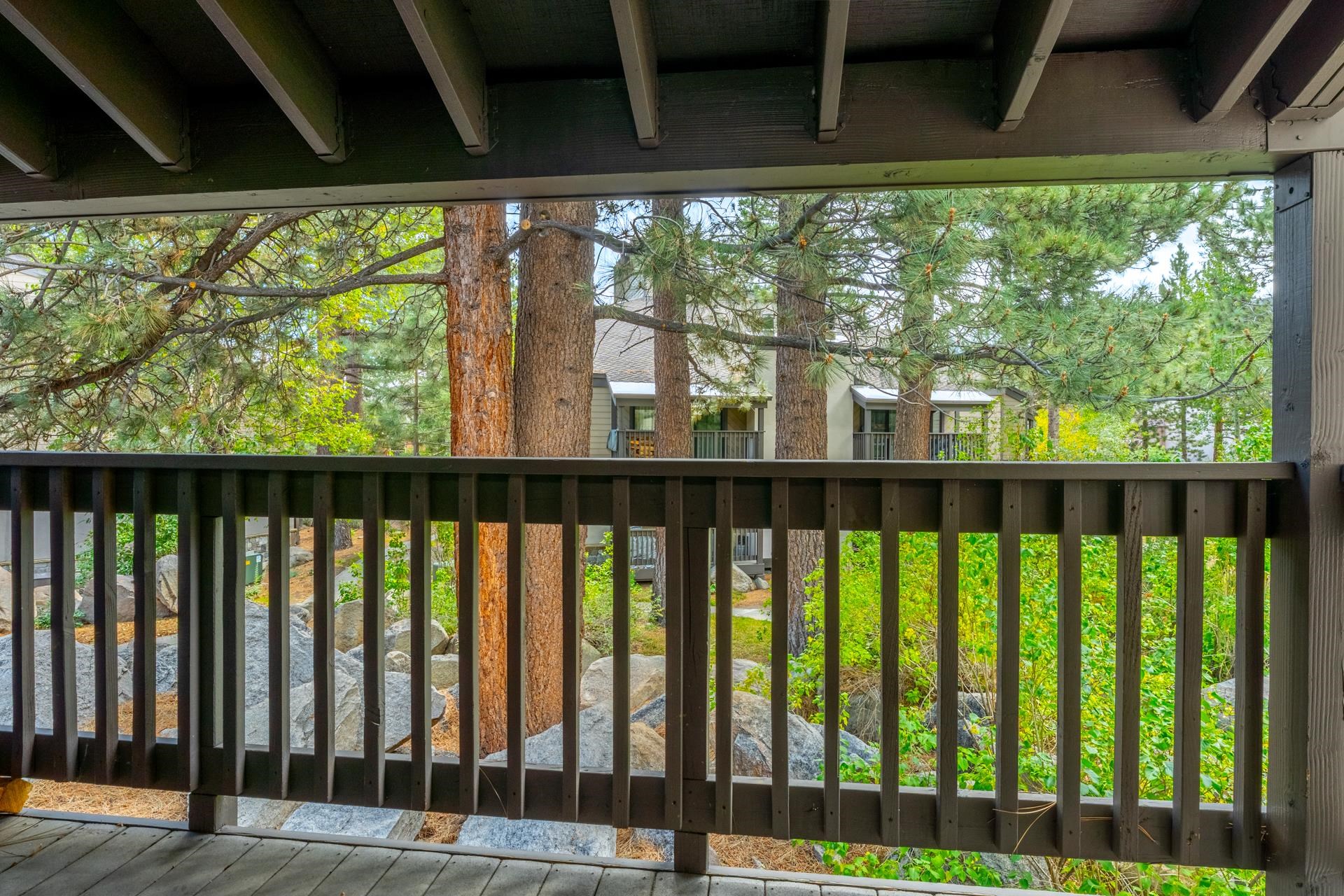 362 Old Mammoth Road, Unit 59 Mammoth Lakes, CA 93546 - Photo 26 of 35 Wood deck with dark-stained railing
