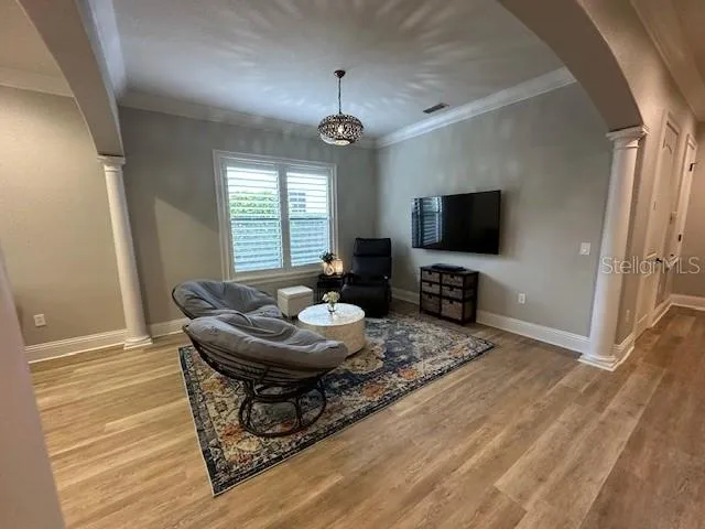 a spacious bathroom with a double vanity sink a mirror and a shower