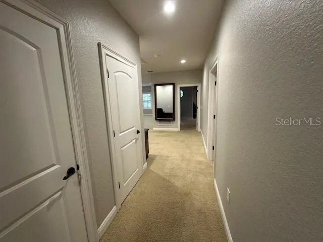 a bed room with a bed and a couch