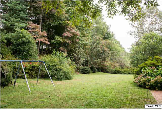 2713 Huntington Road Charlottesville, VA 22901 - Photo 14 of 17 a backyard of a house and trees