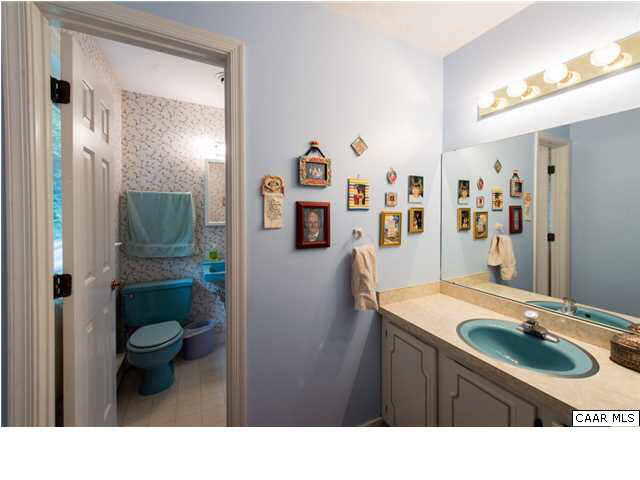 2713 Huntington Road Charlottesville, VA 22901 - Photo 8 of 17 a bathroom with a sink vanity and toilet