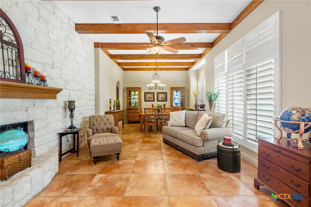 166 Post Oak Bend Inez, TX 77968 - Photo 12 of 48 a living room with furniture and a fireplace