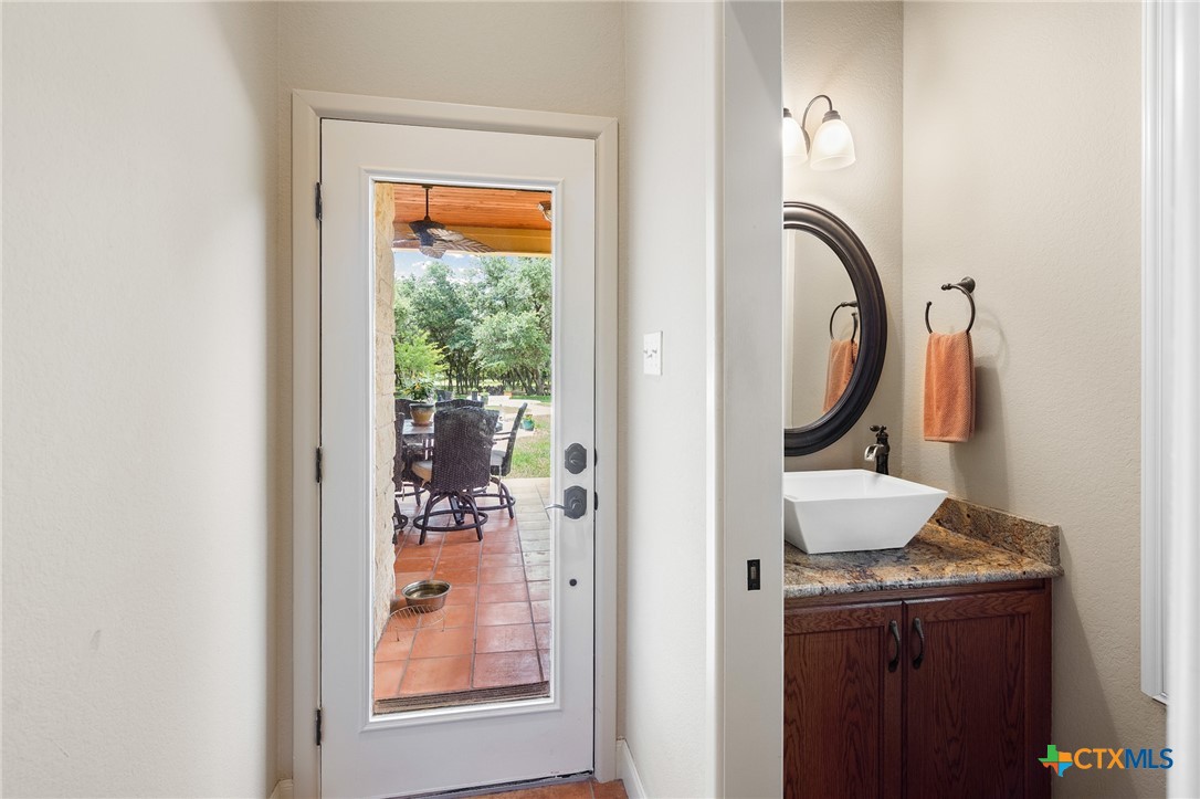 166 Post Oak Bend Inez, TX 77968 - Photo 23 of 48 a close view of a bathroom sink and a mirror