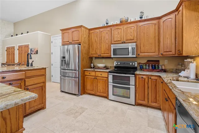a bathroom with a toilet and shower