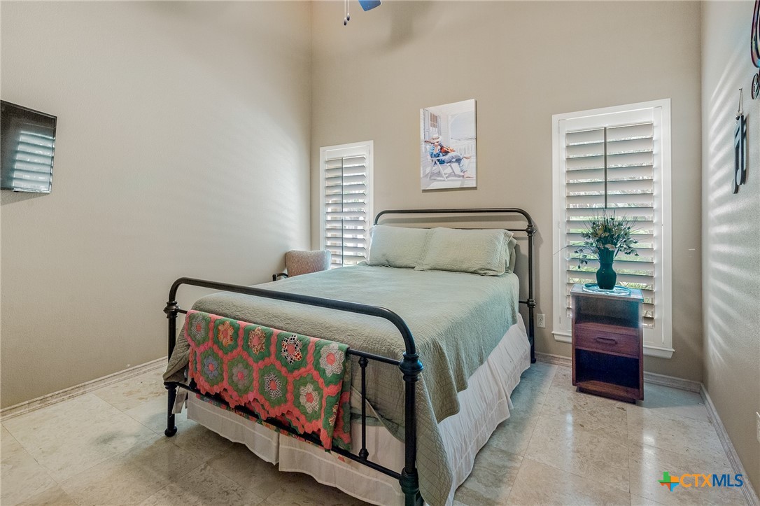 166 Post Oak Bend Inez, TX 77968 - Photo 43 of 48 a bedroom with a bed and a window