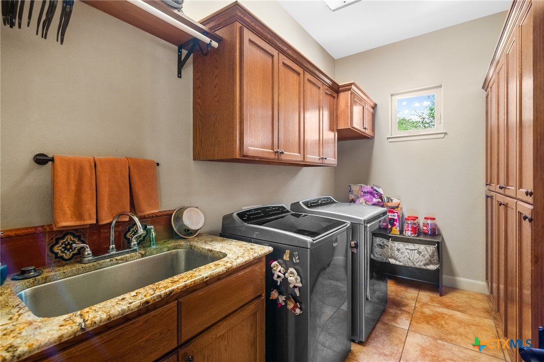 166 Post Oak Bend Inez, TX 77968 - Photo 47 of 48 a kitchen that has a sink and a stove