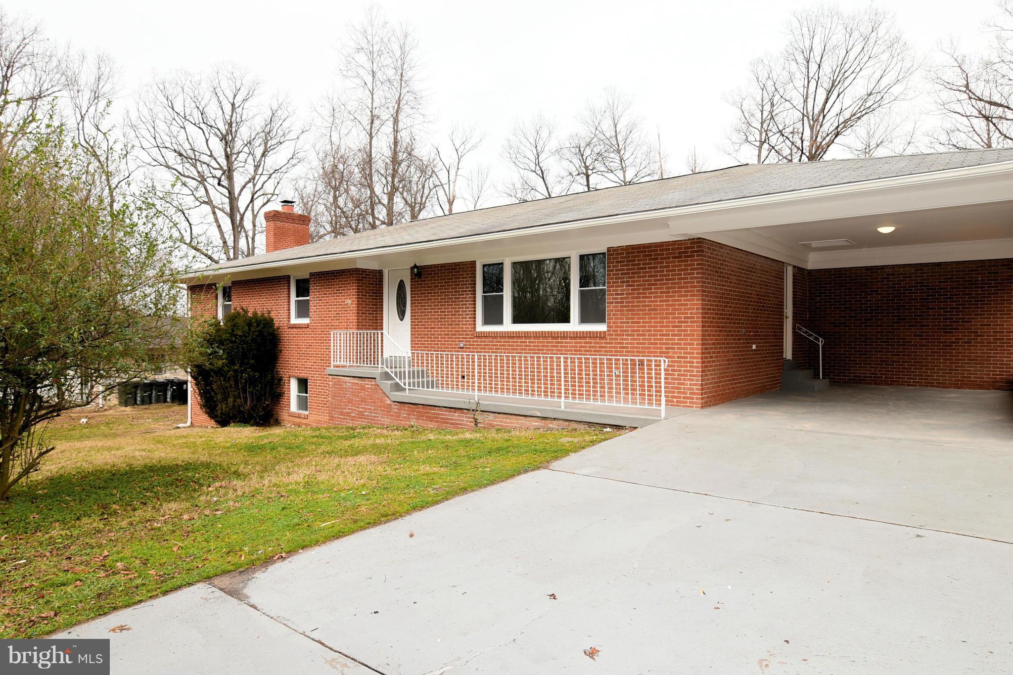 6504 Springbrook Lane Clinton, MD 20735 - Photo 2 of 30 a view of a house with pool and a yard