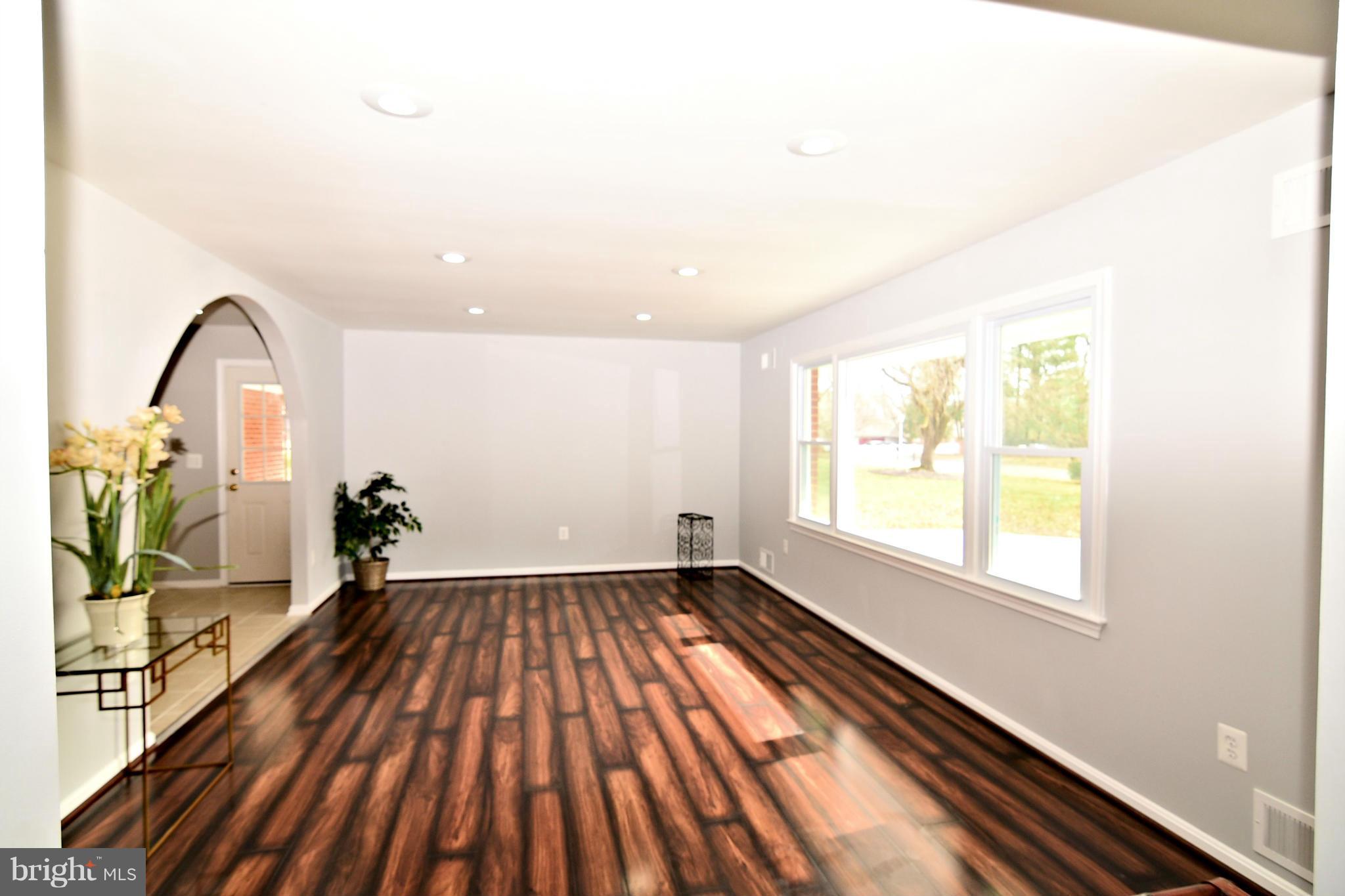 6504 Springbrook Lane Clinton, MD 20735 - Photo 4 of 30 a view of empty room with wooden floor