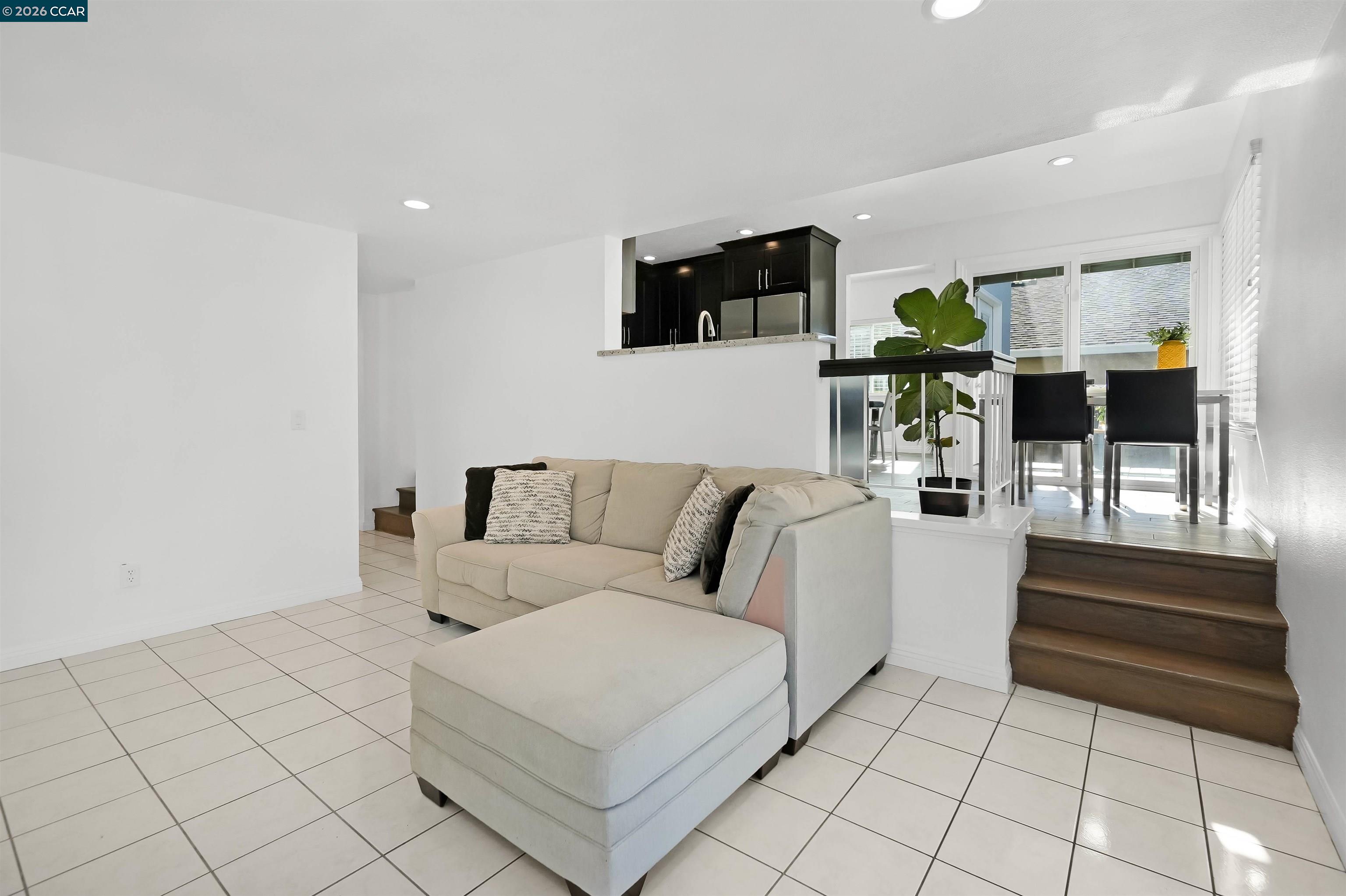 162 Woodfield Hercules, CA 94547 - Photo 21 of 59 a living room with furniture and a flat screen tv
