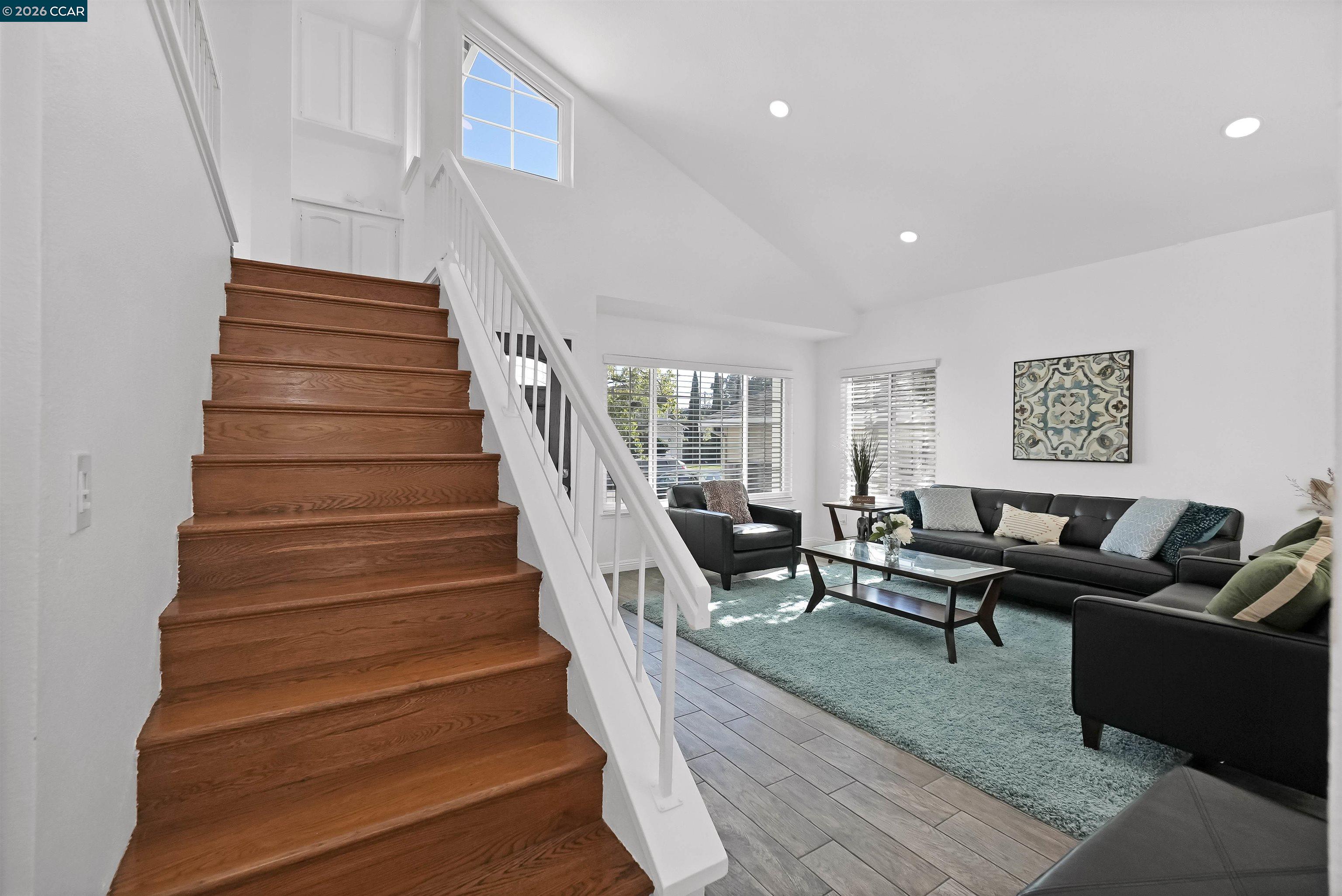 162 Woodfield Hercules, CA 94547 - Photo 29 of 59 a living room with furniture and stairs