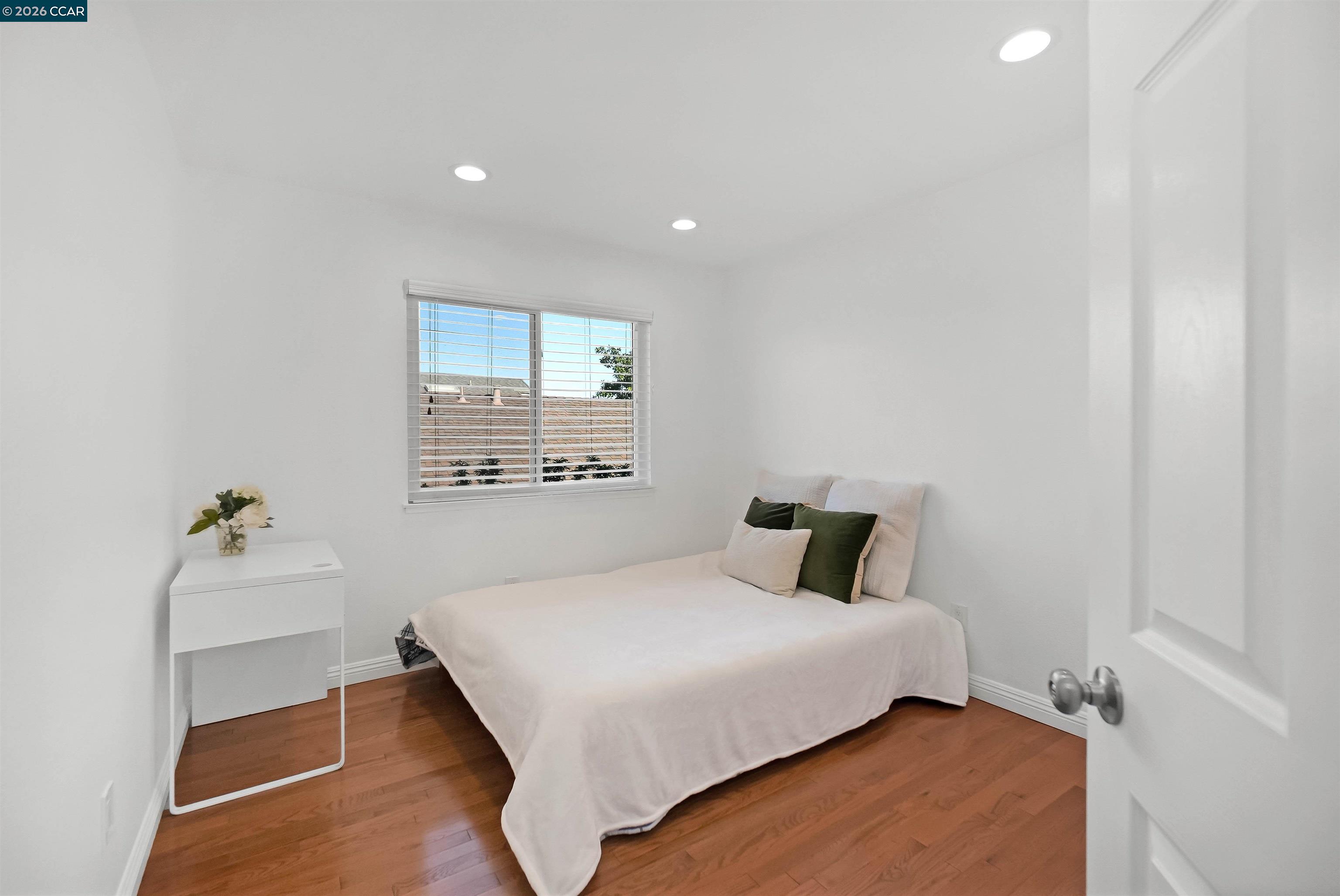 162 Woodfield Hercules, CA 94547 - Photo 37 of 59 a bedroom with a bed and a window