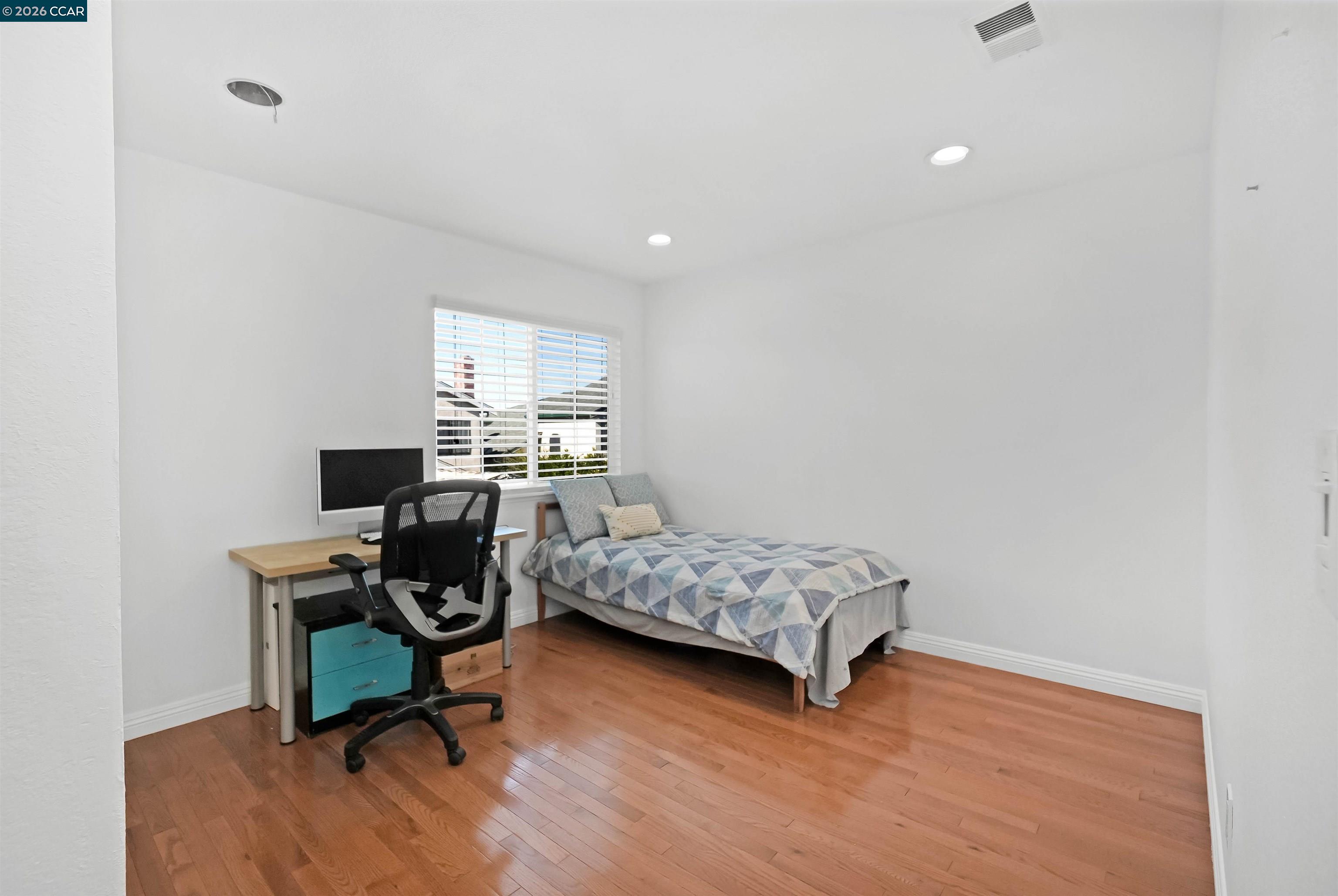 162 Woodfield Hercules, CA 94547 - Photo 38 of 59 a bedroom with a workspace