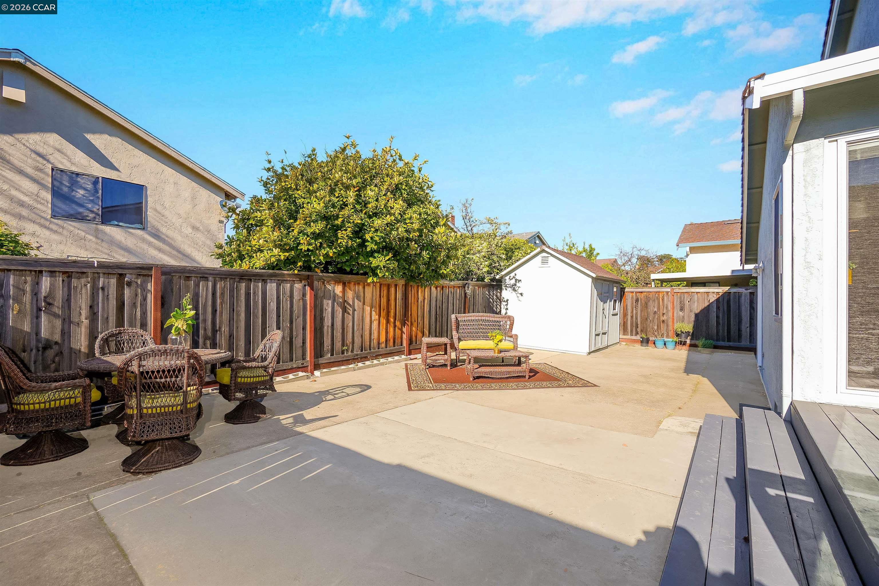 162 Woodfield Hercules, CA 94547 - Photo 41 of 59 a backyard of a house with table and chairs