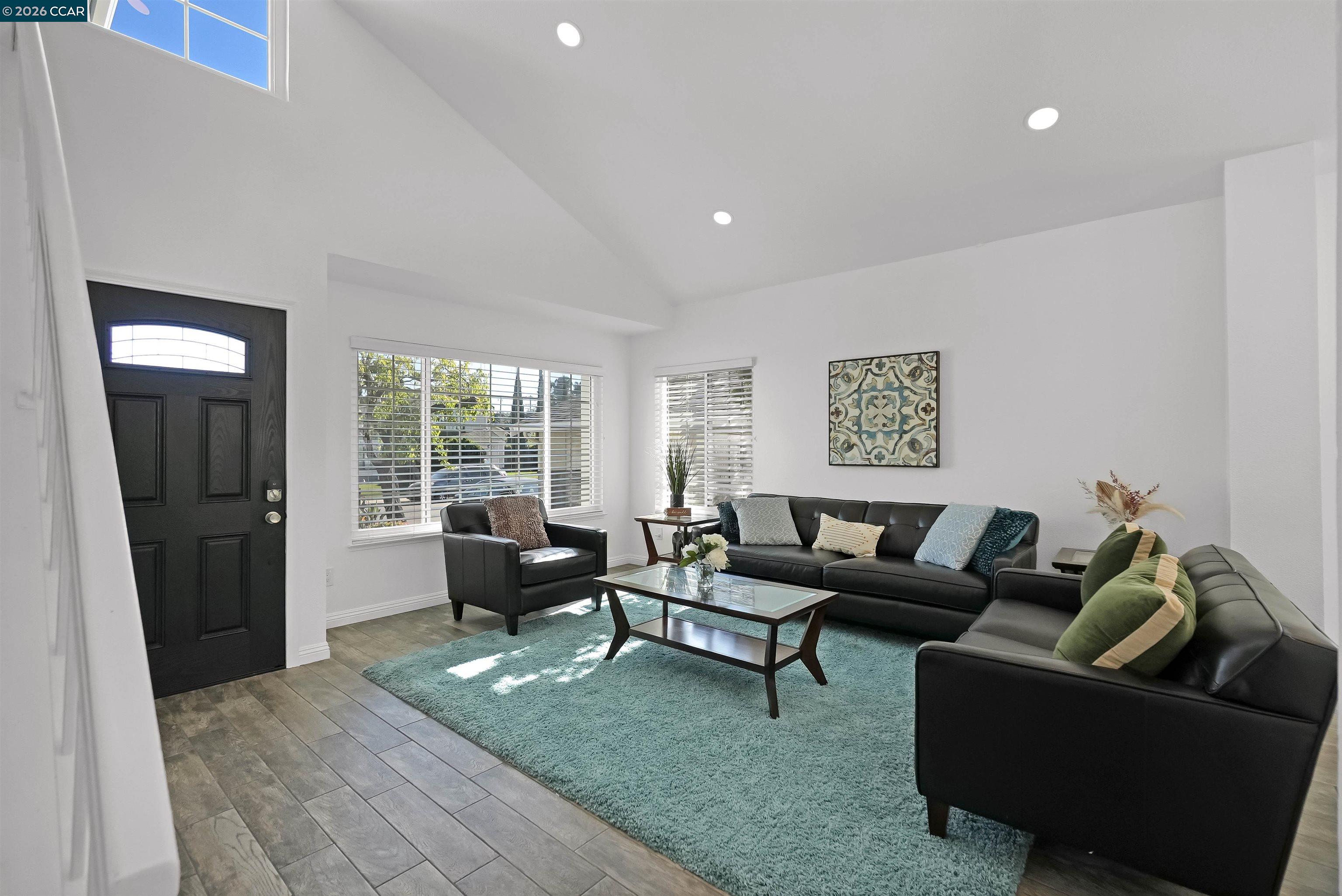 162 Woodfield Hercules, CA 94547 - Photo 8 of 59 a living room with furniture and a couch