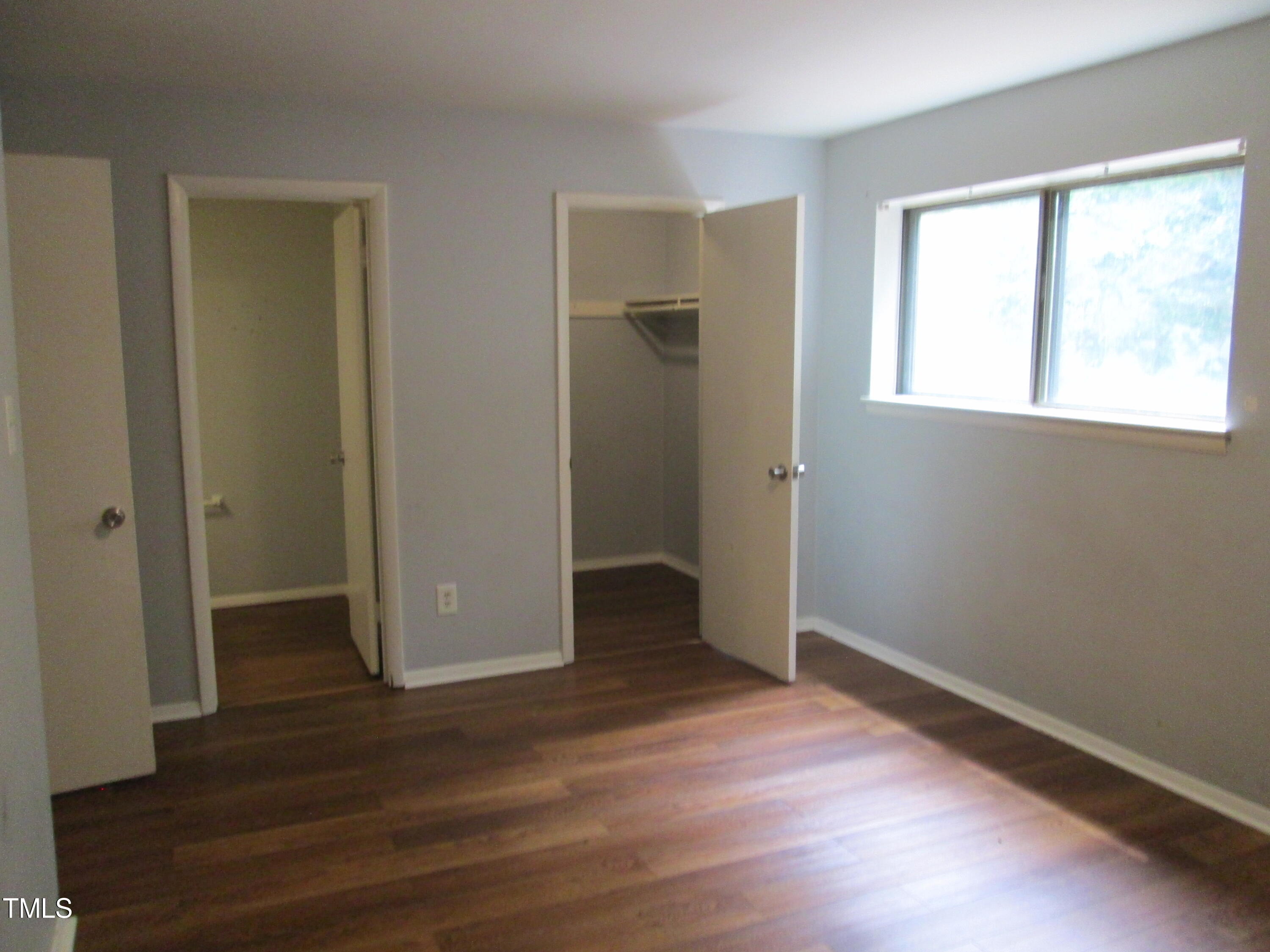 1130 Schaub Drive, Unit E Raleigh, NC 27606 - Photo 16 of 34 Primary Bedroom