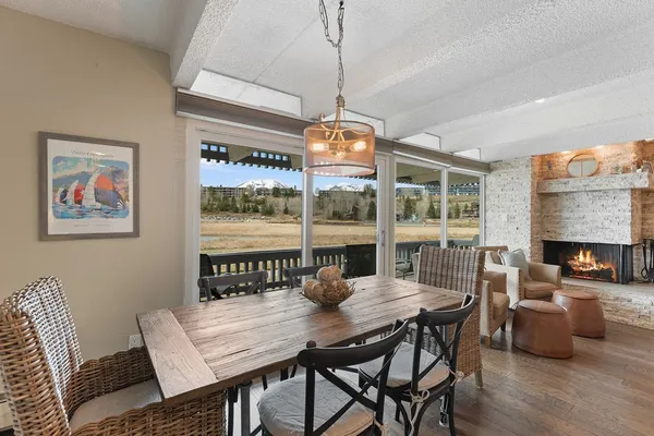 a view of a dining room with furniture window and outside view