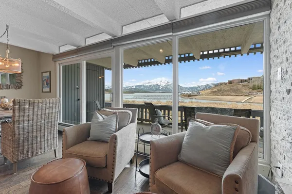 a balcony with furniture and outdoor view