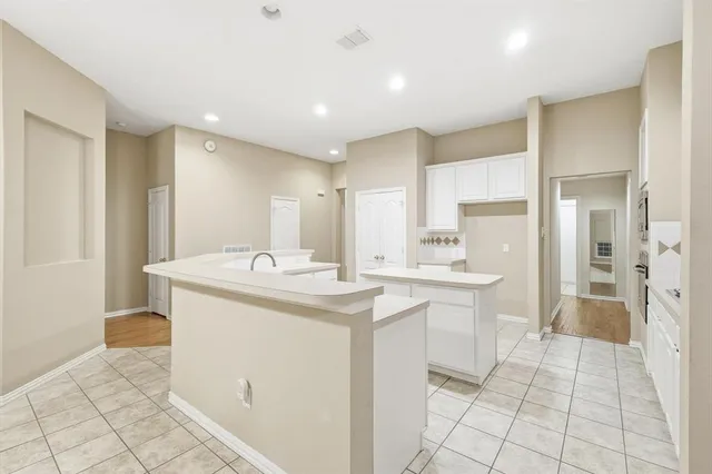 a bathroom with a sink a mirror and a shower