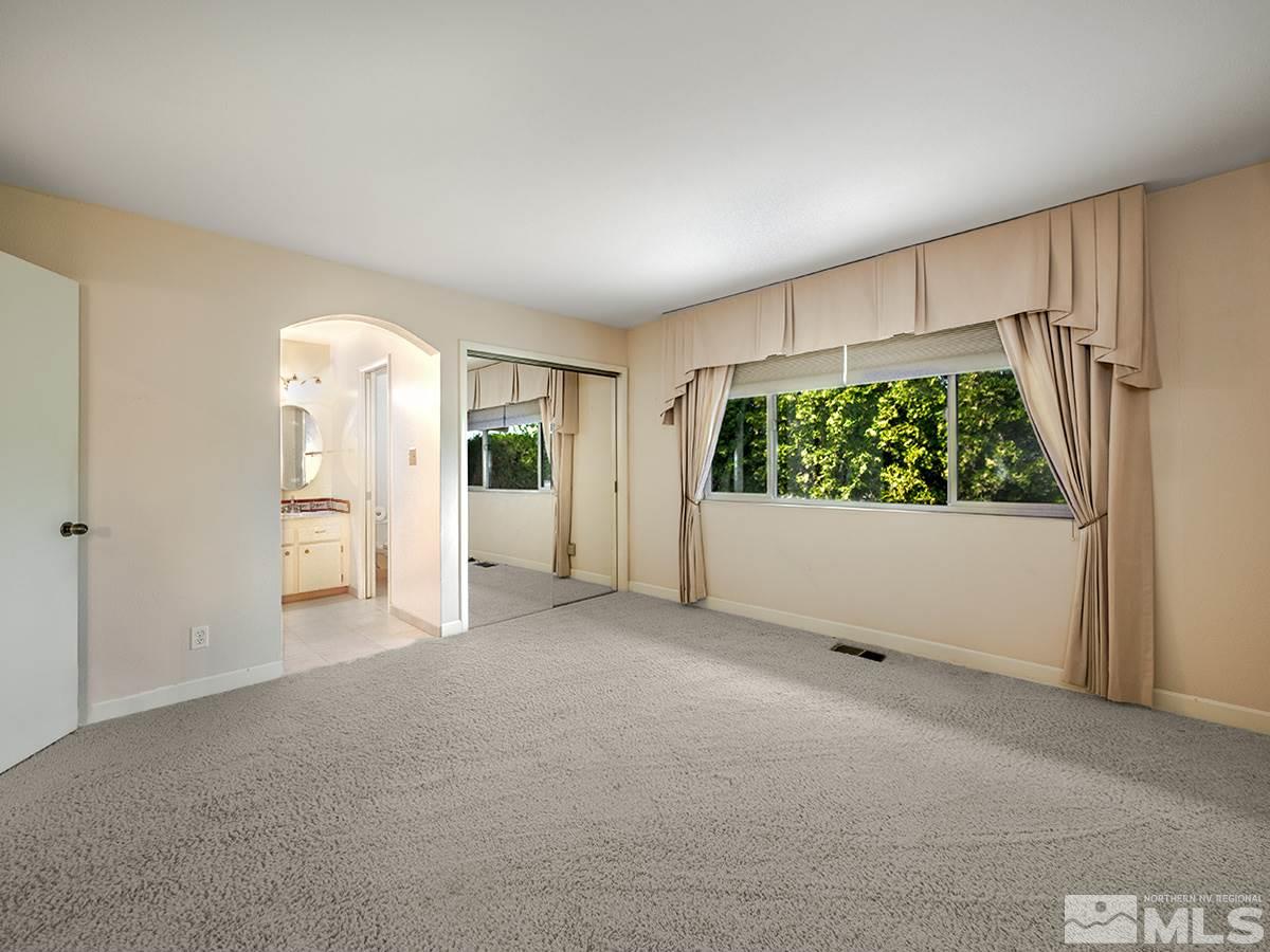 3115 Corey Drive Reno, NV 89509 - Photo 11 of 20 an empty room with windows and entrance