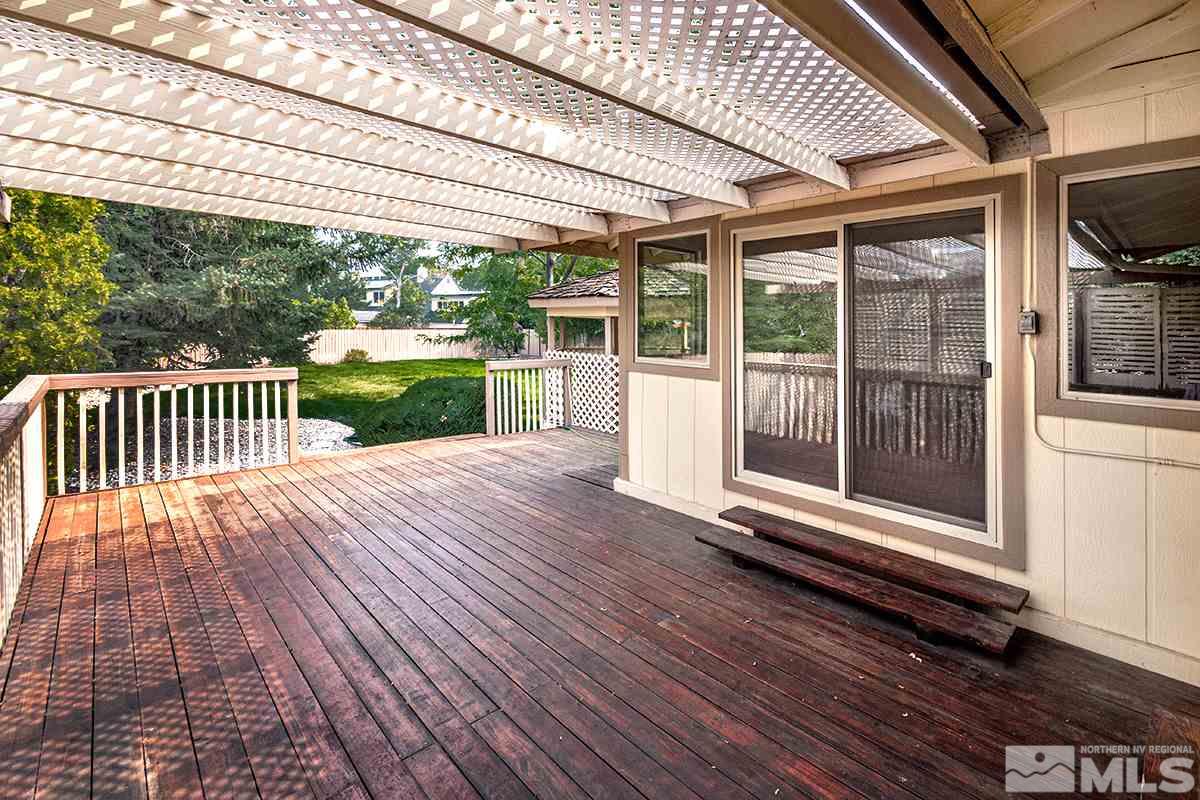 3115 Corey Drive Reno, NV 89509 - Photo 17 of 20 a view of backyard with porch and wooden floor