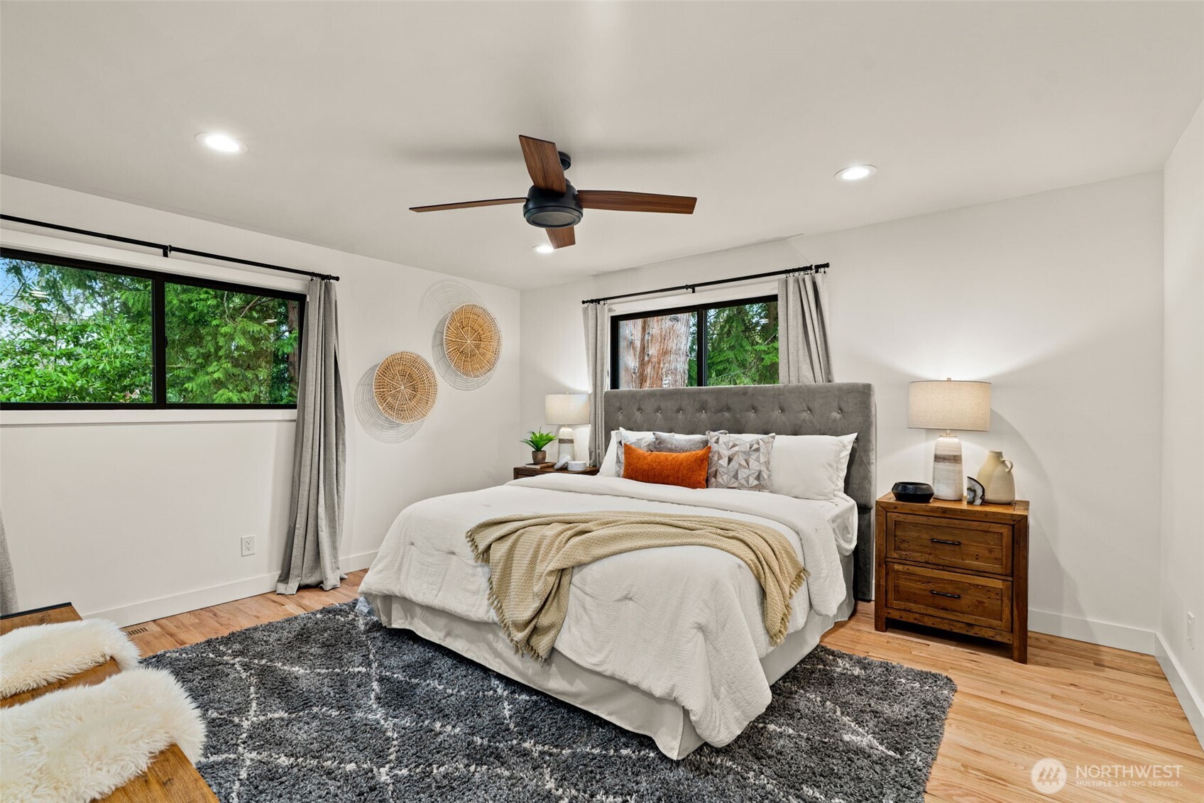 19125 94th Avenue West Edmonds, WA 98020 - Photo 16 of 37 a bedroom with a large bed and a window