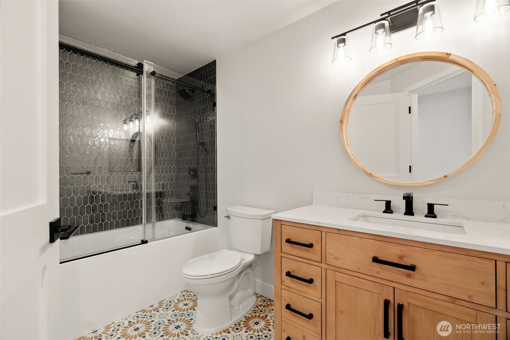 19125 94th Avenue West Edmonds, WA 98020 - Photo 29 of 37 a bathroom with a sink toilet and shower