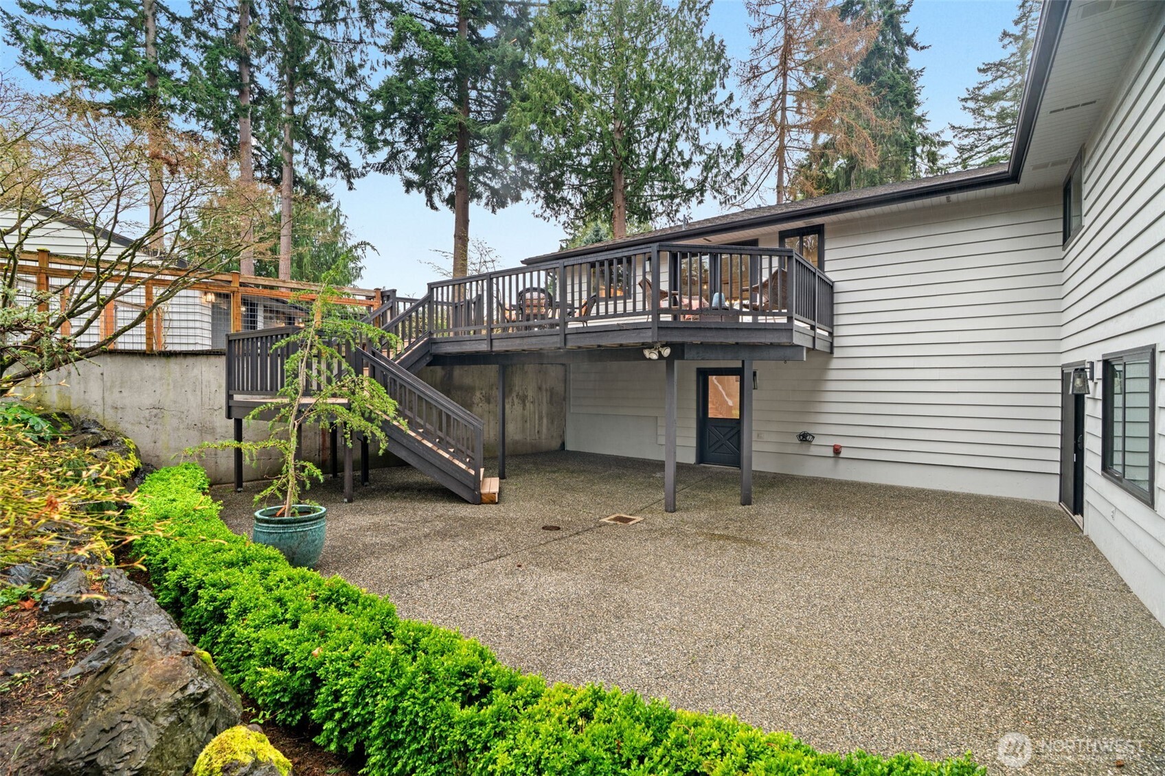 19125 94th Avenue West Edmonds, WA 98020 - Photo 33 of 37 a backyard of a house with barbeque oven table and chairs