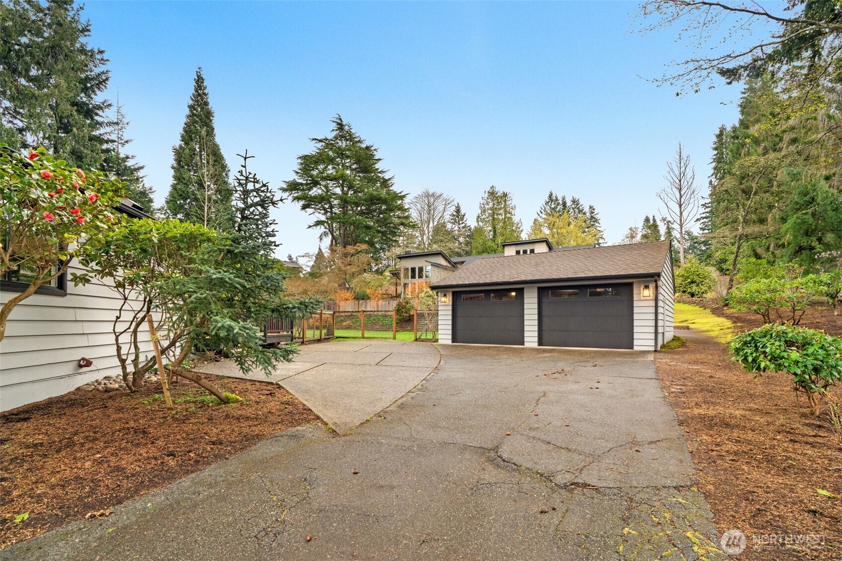 19125 94th Avenue West Edmonds, WA 98020 - Photo 35 of 37 a front view of a house with a yard and garage