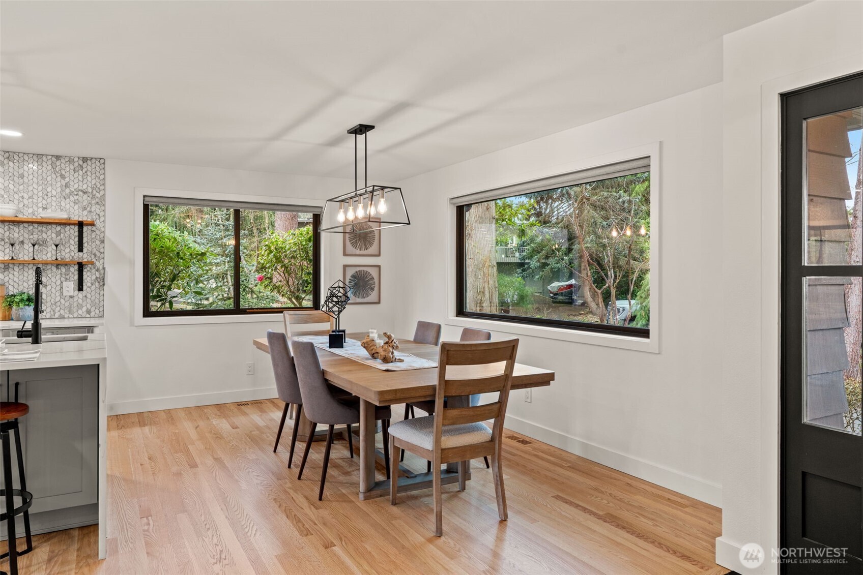 19125 94th Avenue West Edmonds, WA 98020 - Photo 10 of 37 a view of a dining room with furniture window and outside view