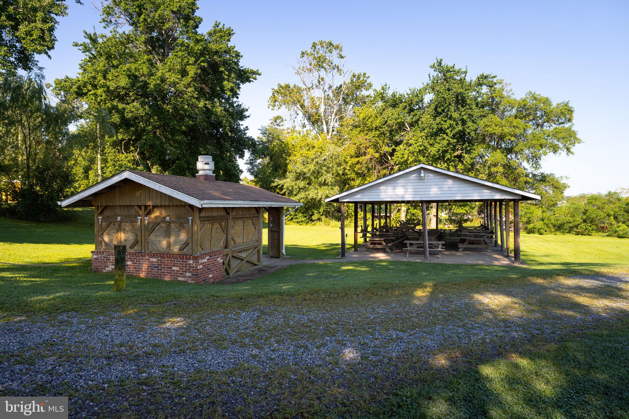 77 Randall Road Colonial Beach, VA 22443 - Photo 44 of 44 Charming outdoor gathering spaces await.