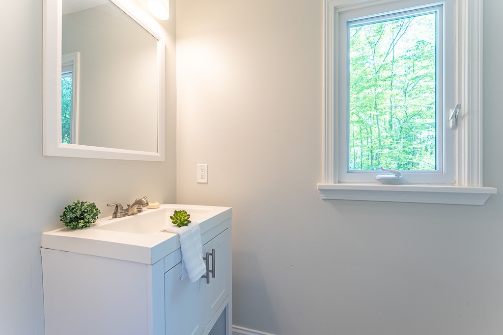 220 Hibiscus Drive Rochester, NY 14618 - Photo 45 of 50 A powder room rounds out the first floor.