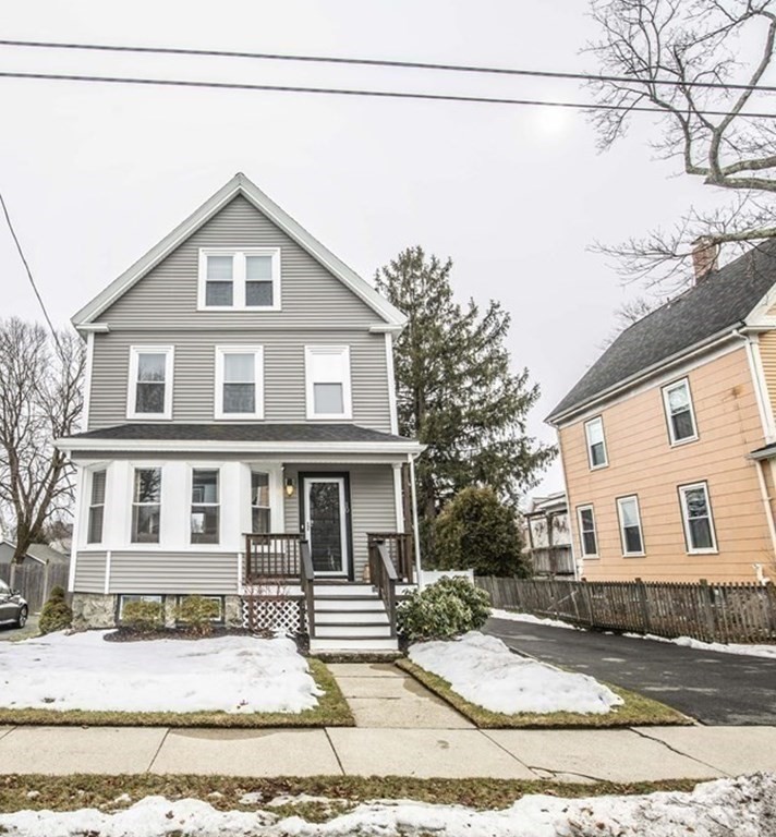 10 Columbus Avenue Saugus, MA 01906 - Photo 1 of 38 a view of a house with a tree in the background