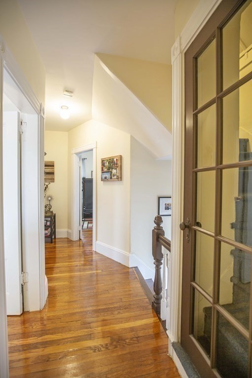 10 Columbus Avenue Saugus, MA 01906 - Photo 19 of 38 a view of a room with wooden floor and windows