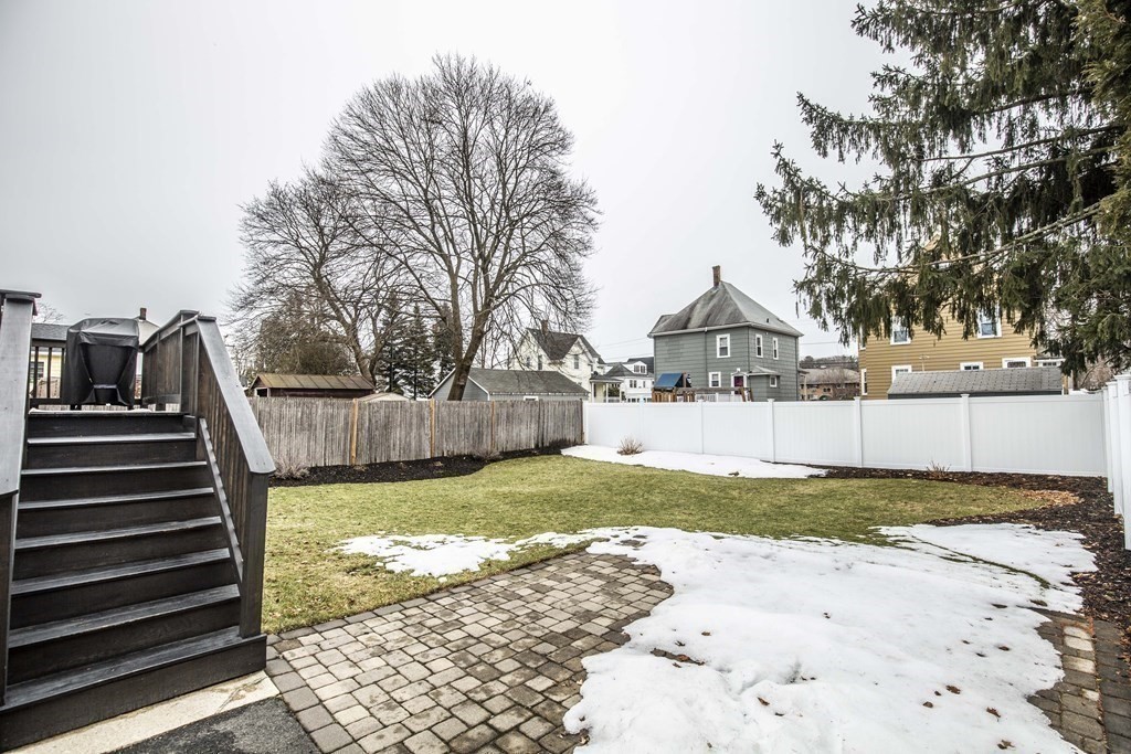 10 Columbus Avenue Saugus, MA 01906 - Photo 28 of 38 a view of a yard and front view of a house