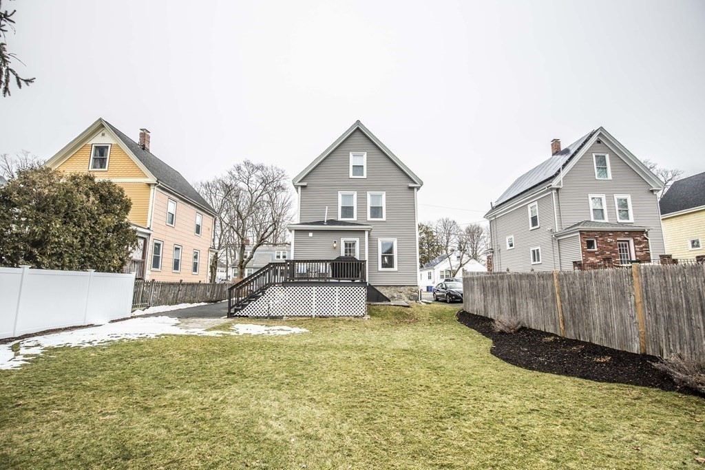 10 Columbus Avenue Saugus, MA 01906 - Photo 29 of 38 a view of a house with a yard and sitting area