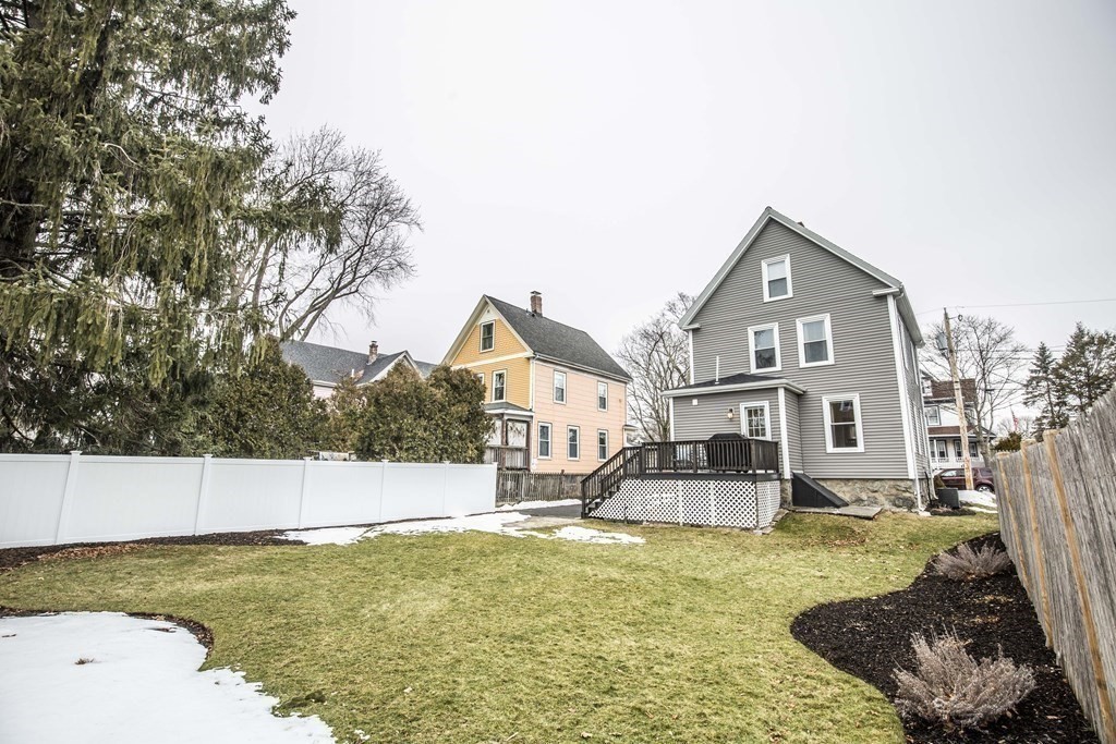 10 Columbus Avenue Saugus, MA 01906 - Photo 30 of 38 a front view of a house with a yard
